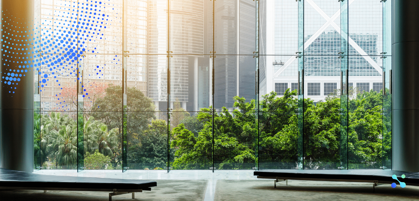 Modern cityscape seen through a glass window, symbolizing fintech’s role in transforming relationships between consumers and banks.